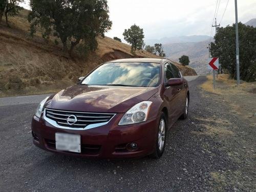 Photo of a 2010-2012 Nissan Altima in Tuscan Sun (paint color code NAD