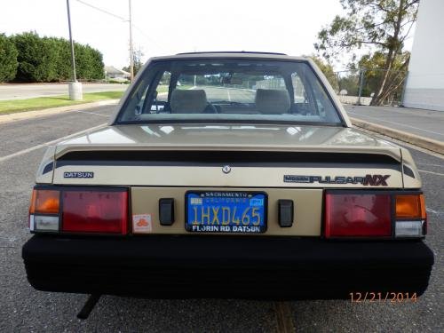 Photo of a 1983 Nissan Pulsar in Nugget Gold Metallic (paint color code 160