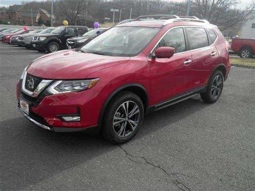 Photo of a 2017 Nissan Rogue in Palatial Ruby (paint color code NBF