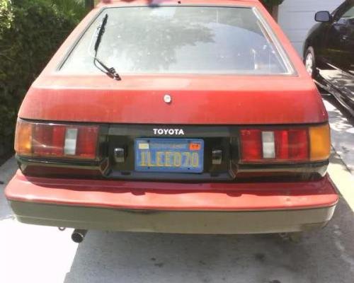 Photo of a 1984 Toyota Corolla in Red<br>(AKA Black) (paint color code 2M9