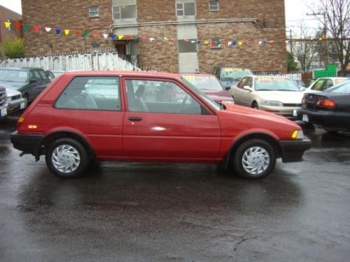 Photo of a 1985-1988 Toyota Corolla in Red<br>(AKA Black(2T6:3E6|202)) (paint color code 3E6