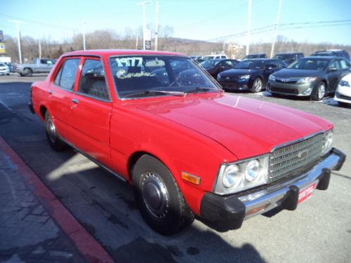 Photo Image Gallery & Touchup Paint: Toyota Corona in Red    (336)  YEARS: 1976-1978