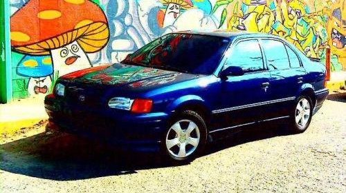 Photo Image Gallery & Touchup Paint: Toyota Tercel in Nightshadow Pearl   (8K0)  YEARS: 1995-1996