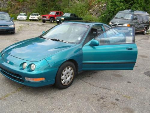 Photo of a 1994-1995 Acura Integra in Paradise Blue-Green Pearl (paint color code BG33P