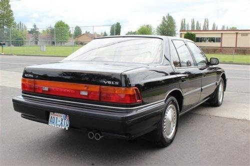 Photo of a 1988 Acura Legend in Granada Black Pearl (paint color code NH503P