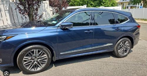 Photo of a 2025 Acura MDX in Canyon River Blue Metallic (paint color code B640M)