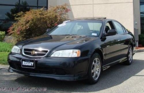 Photo of a 1999 Acura TL in Flamenco Black Pearl (paint color code NH592P)