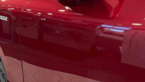 Photo of a 2024 Acura ZDX in Scarlet Red Metallic (paint color code 170H)