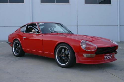 Photo of a 1970-1971 Datsun Z in Monte Carlo Red (paint color code 905)