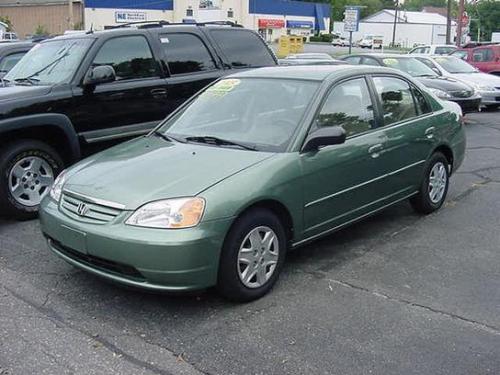 Photo of a 2003-2004 Honda Civic in Galapagos Green Metallic (paint color code G511M)