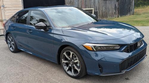 Photo of a 2025 Honda Civic in Blue Lagoon Pearl (paint color code B645P)