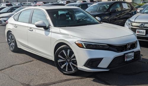 Photo of a 2023 Honda Civic in Platinum White Pearl (paint color code NH883P)