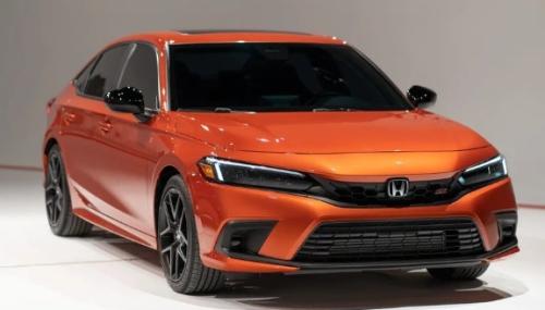 Photo of a 2022-2023 Honda Civic in Blazing Orange Pearl (paint color code YR659P)