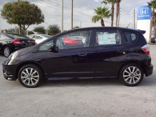 Photo of a 2013 Honda Fit in Midnight Plum Pearl (paint color code RP45P)