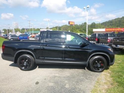 Photo of a 2017-2024 Honda Ridgeline in Crystal Black Pearl (paint color code NH731P)