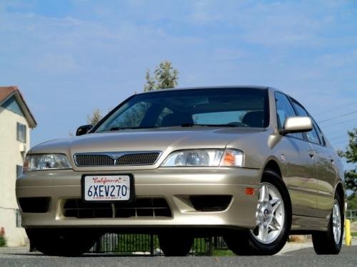 Photo of a 2002 Infiniti G in Sandrock Beige (paint color code EV0)