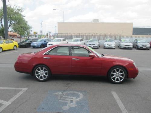 Photo of a 2004 Infiniti M in Garnet Fire (paint color code AY2)