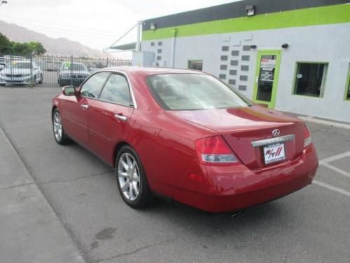 Photo of a 2004 Infiniti M in Garnet Fire (paint color code AY2)