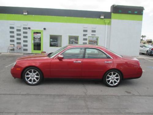 Photo of a 2004 Infiniti M in Garnet Fire (paint color code AY2)