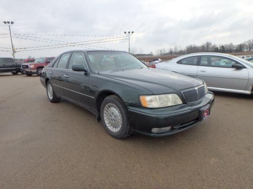 Photo of a 1999 Infiniti Q in Hunter Green (paint color code DT2)