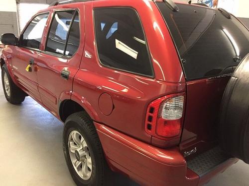 Photo of a 1999 Isuzu Rodeo in Palazzo Red Mica (paint color code 806)