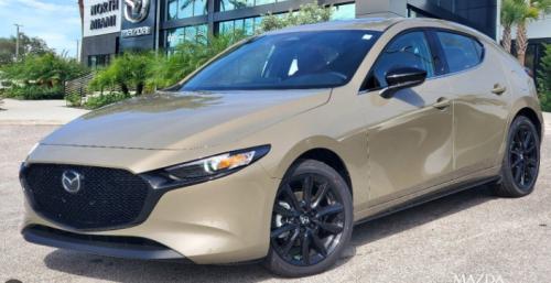 Photo of a 2024-2025 Mazda 3 in Zircon Sand Metallic (paint color code 48T)