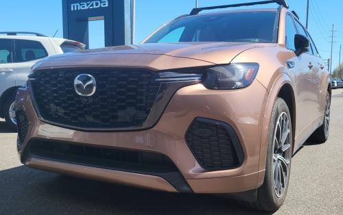 Photo of a 2025 Mazda CX-90 in Melting Copper Metallic (paint color code 52H)