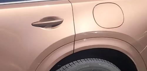 Photo of a 2025 Mazda CX-90 in Melting Copper Metallic (paint color code 52H)