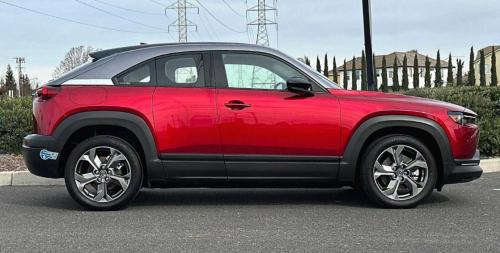 Photo of a 2022 Mazda MX-30 in Dark Gray on Soul Red Crystal Metallic (paint color code 47E)