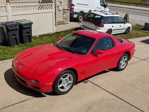 Photo of a 1993-1995 Mazda RX-7 in Vintage Red (paint color code NU)