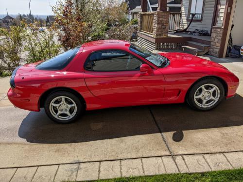 Photo of a 1993-1995 Mazda RX-7 in Vintage Red (paint color code NU)