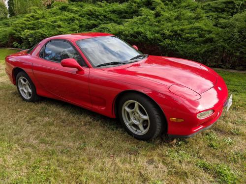 Photo of a 1993-1995 Mazda RX-7 in Vintage Red (paint color code NU)