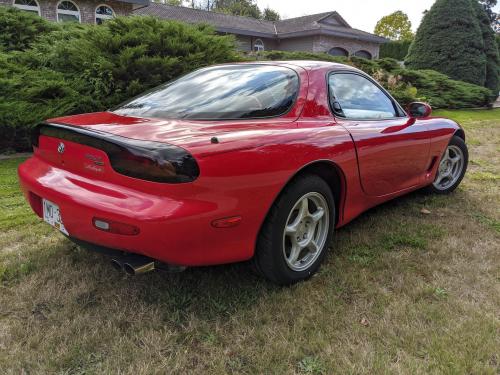 Photo of a 1993-1995 Mazda RX-7 in Vintage Red (paint color code NU)