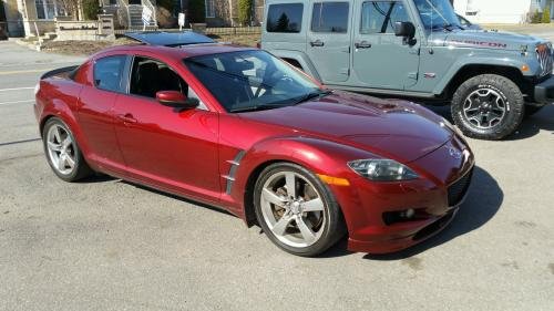 Photo of a 2006 Mazda RX-8 in Copper Red Mica (paint color code 32V)