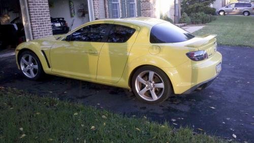 Photo of a 2004 Mazda RX-8 in Lightning Yellow (paint color code A4J)