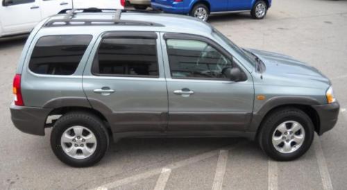 Photo of a 2003-2004 Mazda Tribute in Light Tundra Metallic (paint color code 25X)