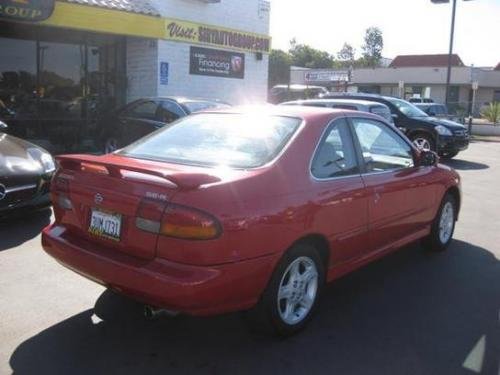 Photo of a 1995 Nissan 200SX in Aztec Red (paint color code AG2