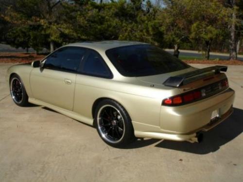 Photo of a 1995-1996 Nissan 240SX in Champagne Gold (paint color code EM1)