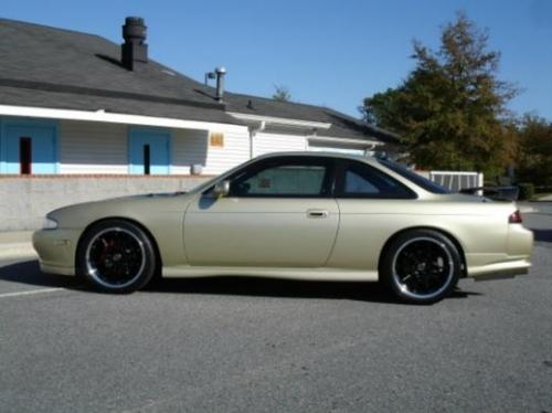 Photo of a 1995-1996 Nissan 240SX in Champagne Gold (paint color code EM1)