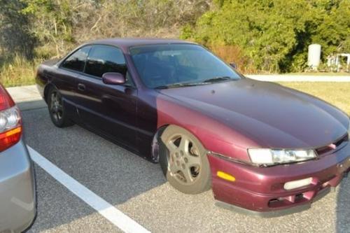 Photo of a 1997 Nissan 240SX in Deep Fuchsia (paint color code LS1)