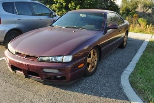 Photo of a 1997-1998 Nissan 240SX in Deep Fuchsia (paint color code LS1)