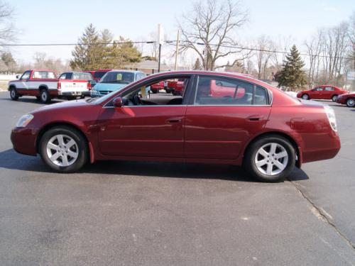 Photo Image Gallery & Touchup Paint: Nissan Altima in Nouveau Ruby (AX3)