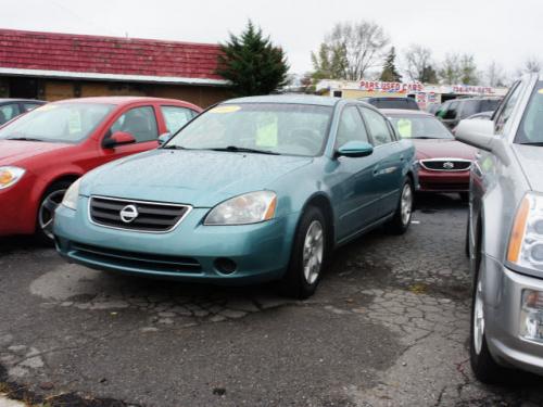 Photo of a 2002-2003 Nissan Altima in Seascape (paint color code FY0)