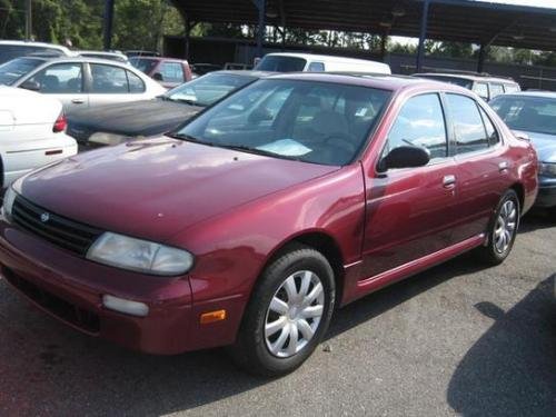 Photo of a 1994 Nissan Altima in Ruby Pearl (paint color code AL0