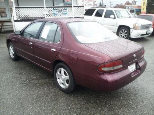 Photo of a 1997 Nissan Altima in Garnet Pearl (paint color code AS1)