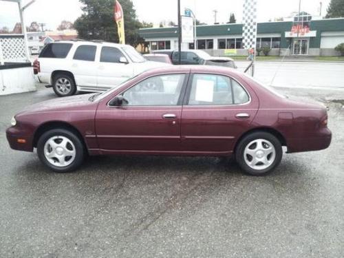 Photo of a 1997 Nissan Altima in Garnet Pearl (paint color code AS1)