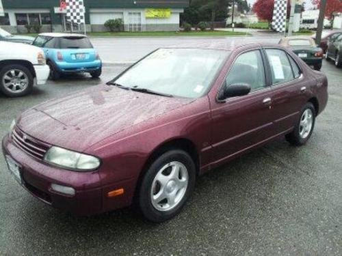 Photo of a 1997 Nissan Altima in Garnet Pearl (paint color code AS1)