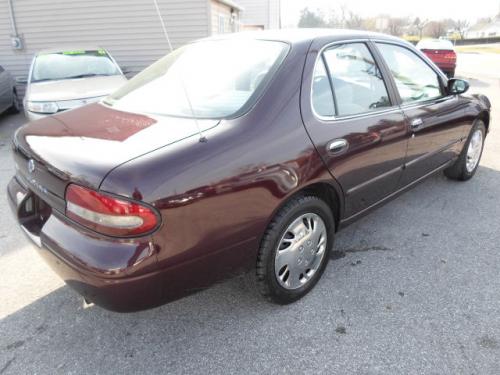 Photo of a 1997 Nissan Altima in Garnet Pearl (paint color code AS1)