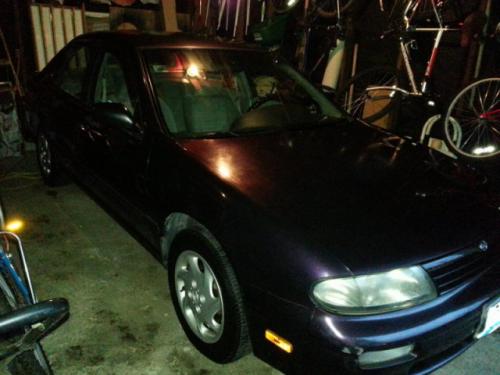 Photo of a 1995-1996 Nissan Altima in Deep Purple Metallic (paint color code LP2)