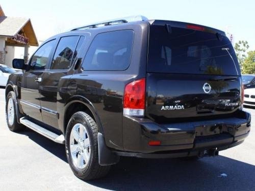 Photo of a 2011-2015 Nissan Armada in Espresso Black (paint color code CAE)